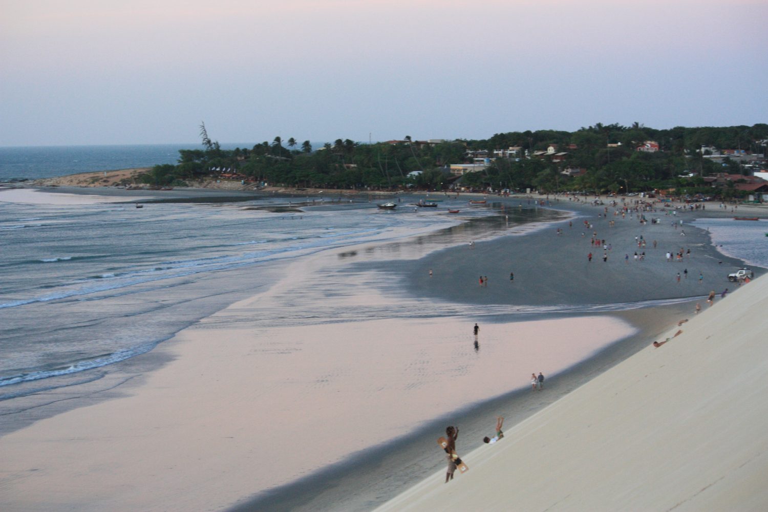 Jericoacoara beach at low tide from the top of a dune. 