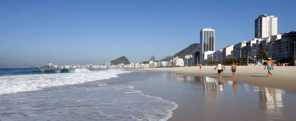 A shot of Copacabana beach with Rio de Janeiro city in the background. 