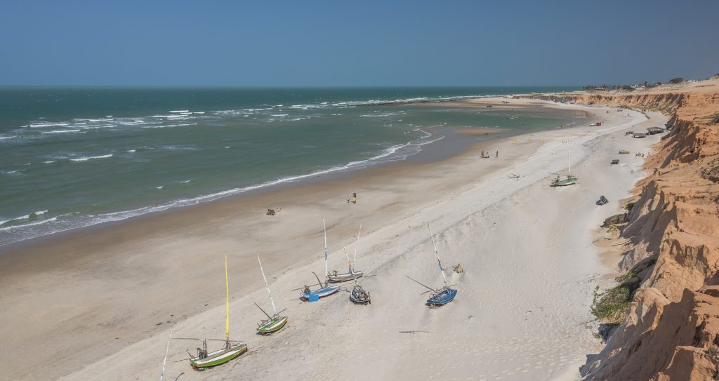 Jangadas sitting on the beach at Canoa Quebrada.