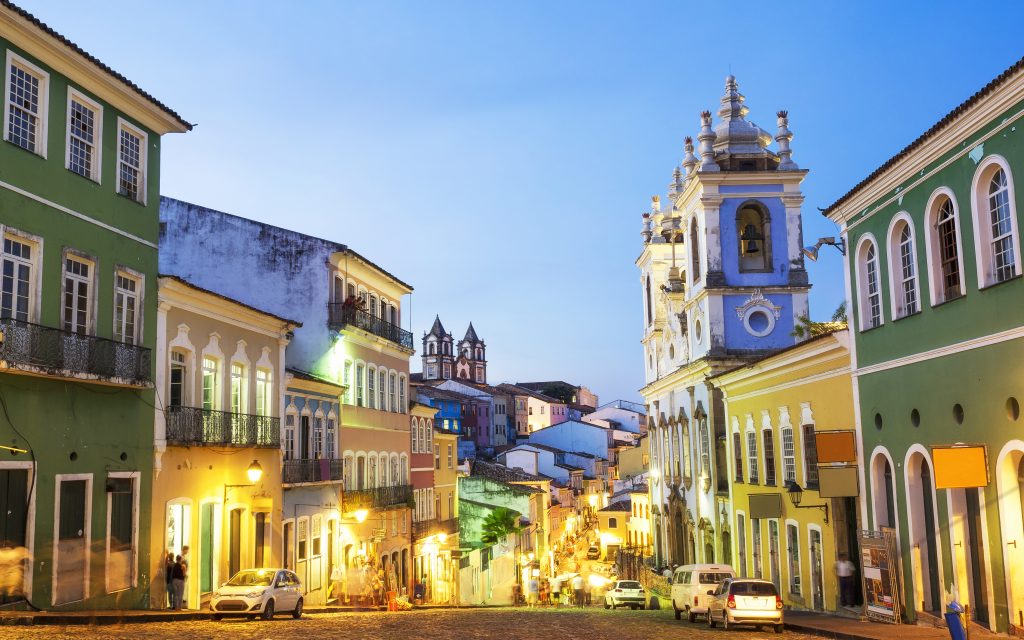 Salvador at dusk with the street lights starting to come on. 