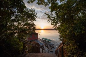 The sun setting over the Amazon river dock of the Anavilhanas lodge. 