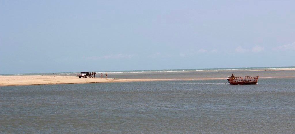 The tide drops at Jericoacoara revealing the sandy bottom. 