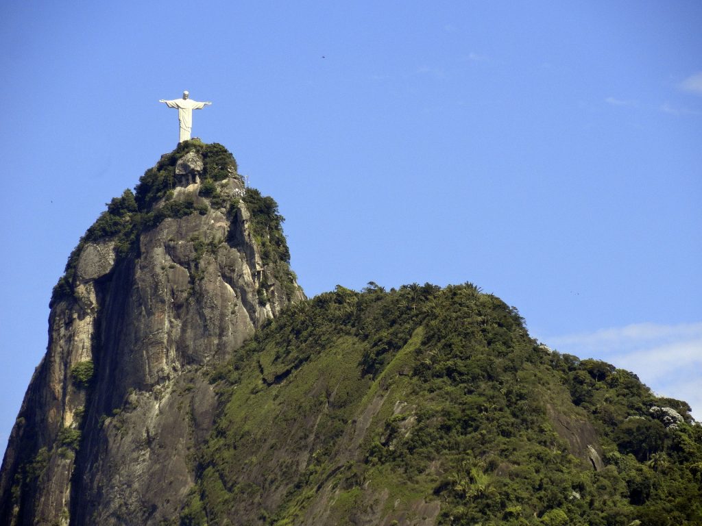 View of Christ the redeemer statue atop corcovado mountain in Rio de Janeiro.