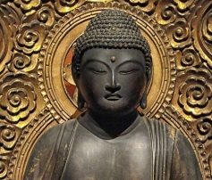 Headshot of buddha statue.