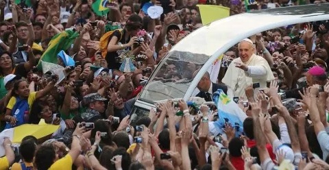 The Pope waves during the Papal visit to Brazil.