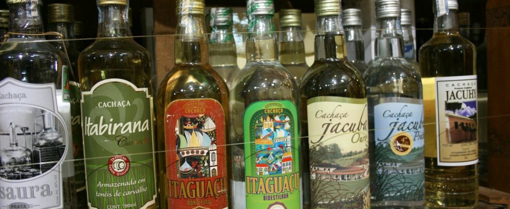 An assortment of bottles of Cachaca.