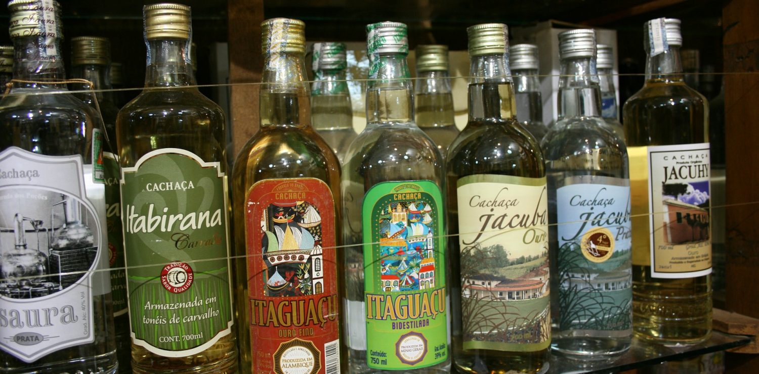 An assortment of bottles of Cachaca.