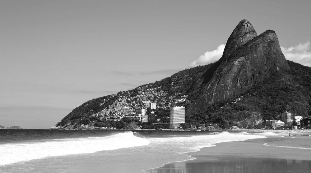 Rio de Janeiro beach with mountain in back right.