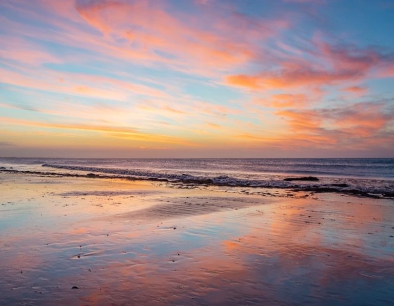 Jericoacoara sunset reflection on beach